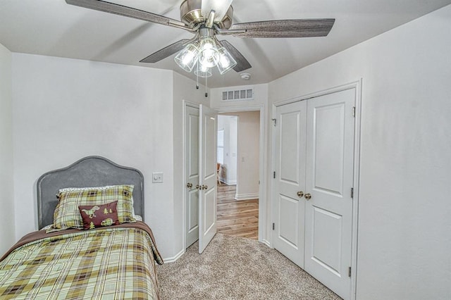 12712 NW 4th St, Yukon, OK 73099 - bedroom featuring carpet floors, ceiling fan, and a closet