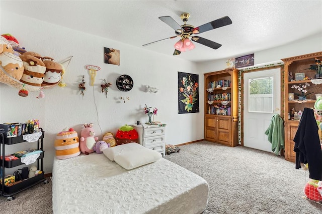 12725 Silver Ln, Oklahoma City, OK 73120 - bedroom with carpet floors, ceiling fan, and a textured ceiling