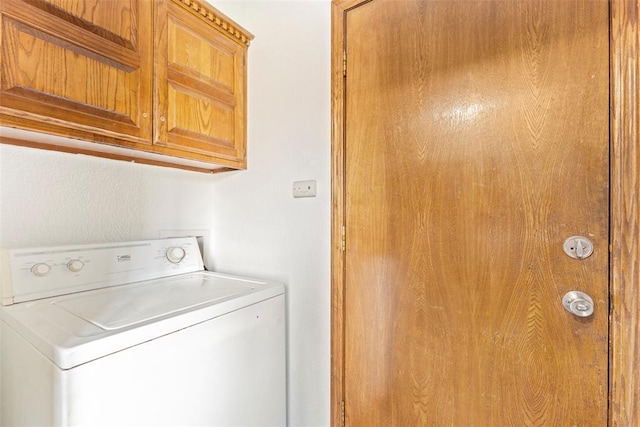 12725 Silver Ln, Oklahoma City, OK 73120 - laundry room featuring washer / clothes dryer and cabinet space