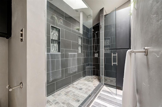 1810 Sandpiper Dr, Edmond, OK 73034 - full bathroom with a tile shower and a skylight
