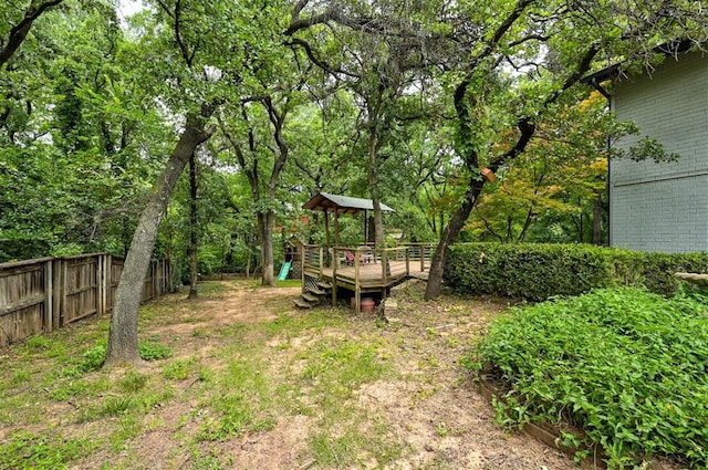 1810 Sandpiper Dr, Edmond, OK 73034 - view of yard with a wooden deck