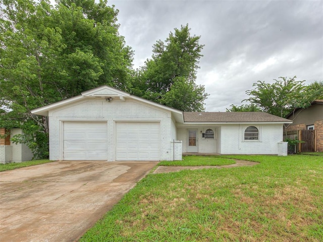833 Willow Brook Dr, Midwest City, OK 73110 - ranch-style home featuring brick siding, concrete driveway, and a garage