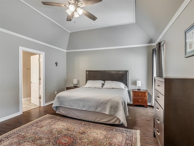3939 S Santa Fe Ave, Norman, OK 73072 - bedroom with vaulted ceiling, dark wood finished floors, a ceiling fan, crown molding, and ensuite bath