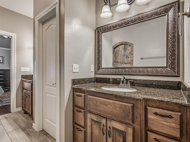 3939 S Santa Fe Ave, Norman, OK 73072 - bathroom featuring vanity and wood finished floors
