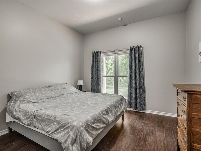 3939 S Santa Fe Ave, Norman, OK 73072 - bedroom with wood finished floors
