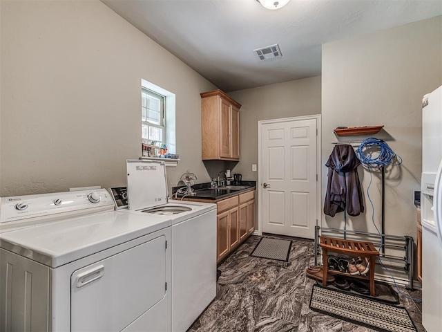 940908 S 3300th Rd, Luther, OK 73054 - washroom with cabinet space, independent washer and dryer, and dark marble finish flooring