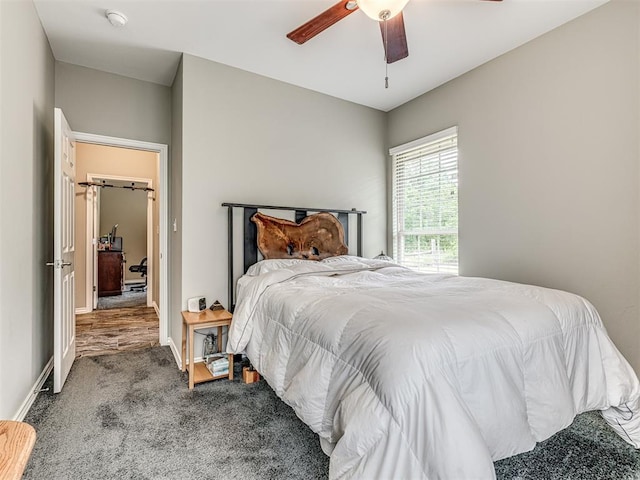 940908 S 3300th Rd, Luther, OK 73054 - carpeted bedroom featuring a ceiling fan
