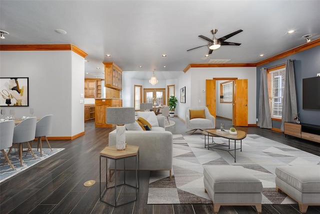 living area with a ceiling fan, wood finished floors, recessed lighting, and ornamental molding