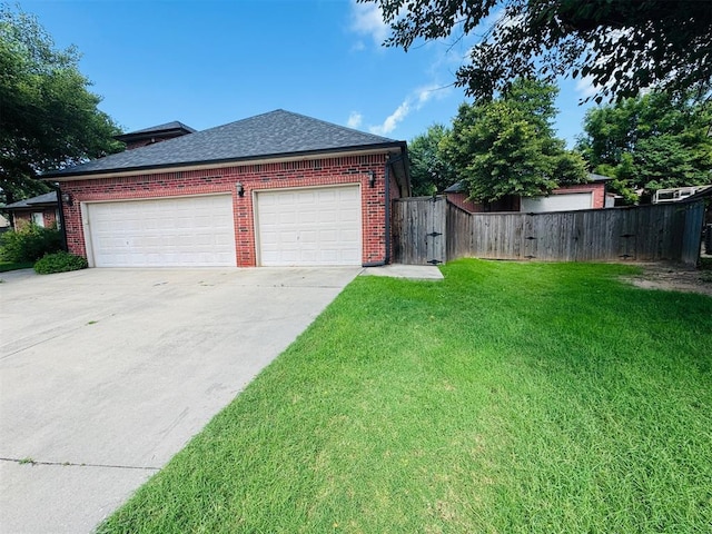 garage featuring driveway