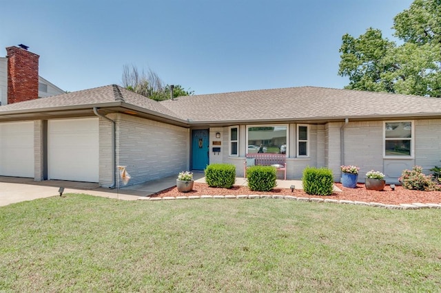 4813 NW 65th St, Oklahoma City, OK 73132 - single story home featuring brick siding, a shingled roof, a garage, and a front lawn