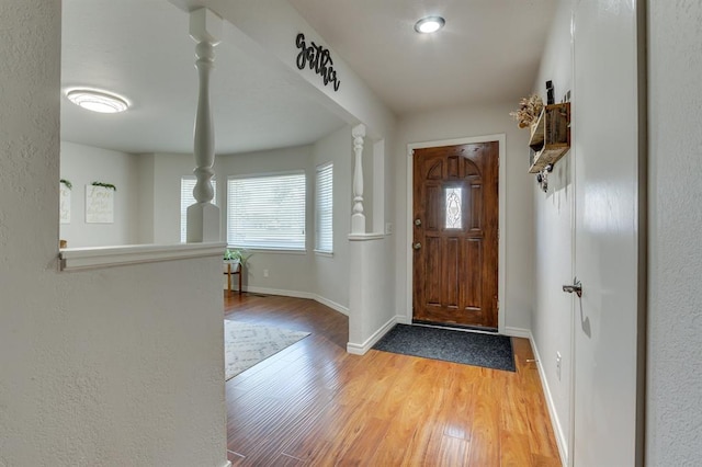 4813 NW 65th St, Oklahoma City, OK 73132 - foyer entrance featuring baseboards and light wood finished floors