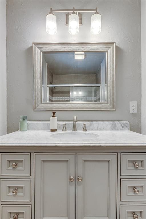 4813 NW 65th St, Oklahoma City, OK 73132 - bathroom with vanity and a shower
