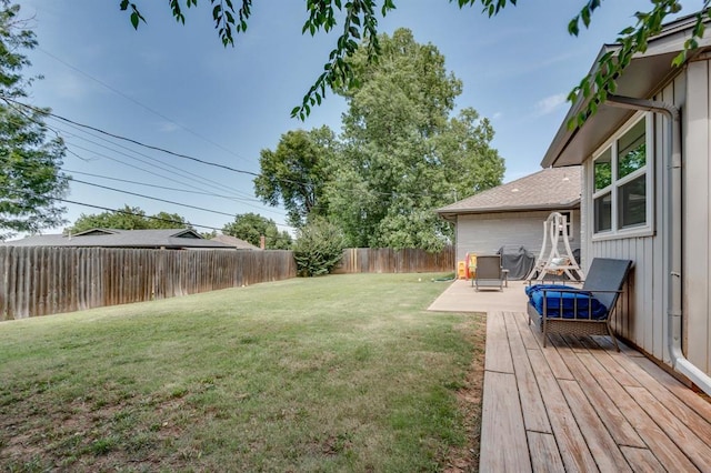 4813 NW 65th St, Oklahoma City, OK 73132 - fenced backyard with a deck