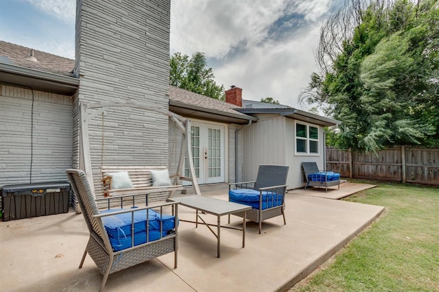 4813 NW 65th St, Oklahoma City, OK 73132 - view of patio / terrace featuring french doors