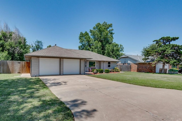 4813 NW 65th St, Oklahoma City, OK 73132 - ranch-style home featuring a garage, concrete driveway, and brick siding