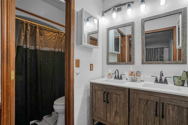 1108 S 13th St, Clinton, OK 73601 - full bathroom with double vanity, tile patterned floors, and a textured wall