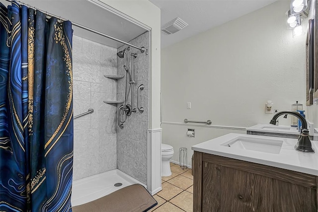 1108 S 13th St, Clinton, OK 73601 - full bathroom featuring tile patterned floors, vanity, and a tile shower
