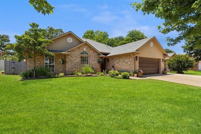 5 Larkens Pl, Shawnee, OK 74801 - single story home with brick siding, a garage, driveway, and a shingled roof