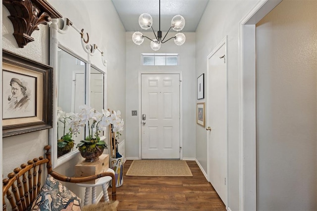 5 Larkens Pl, Shawnee, OK 74801 - entrance foyer featuring dark wood-style flooring and a chandelier