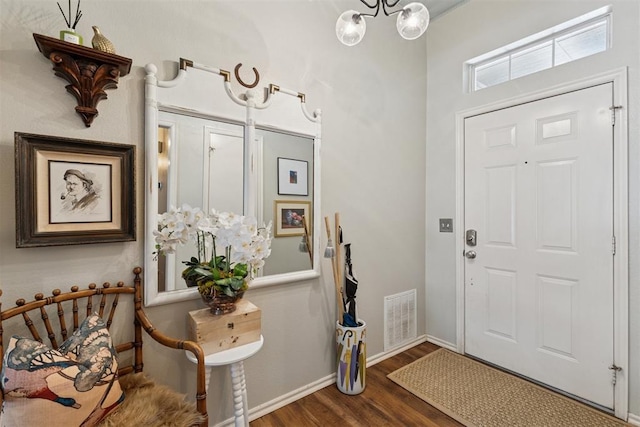 5 Larkens Pl, Shawnee, OK 74801 - entryway with wood finished floors and a chandelier