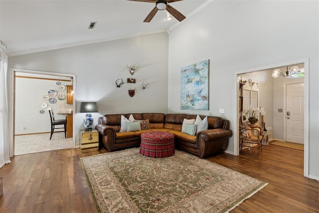5 Larkens Pl, Shawnee, OK 74801 - living area with crown molding, a ceiling fan, wood finished floors, and high vaulted ceiling