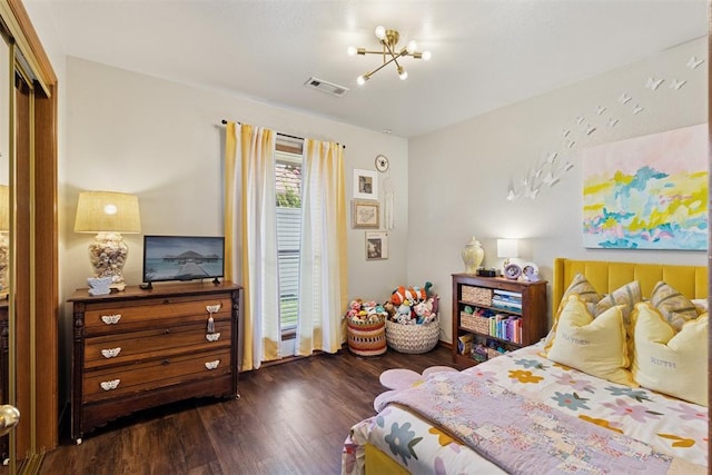 5 Larkens Pl, Shawnee, OK 74801 - bedroom featuring a chandelier and dark wood-style flooring