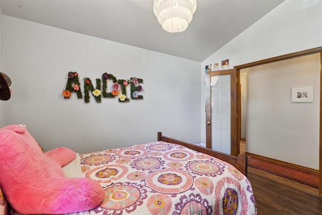 5 Larkens Pl, Shawnee, OK 74801 - bedroom with lofted ceiling, wood finished floors, and a chandelier