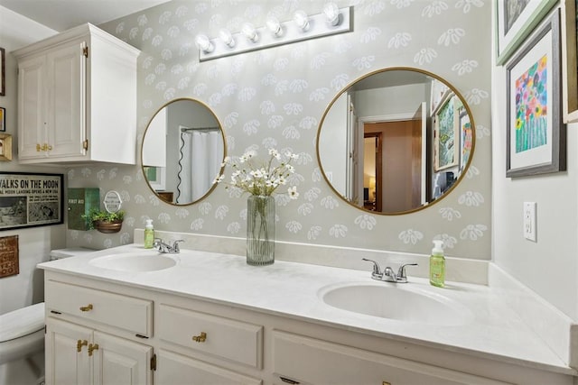 5 Larkens Pl, Shawnee, OK 74801 - full bathroom featuring wallpapered walls and double vanity