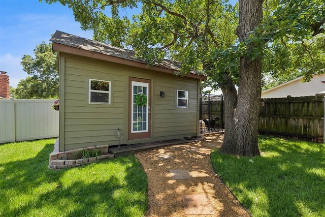 5 Larkens Pl, Shawnee, OK 74801 - rear view of property featuring a fenced backyard and an outbuilding