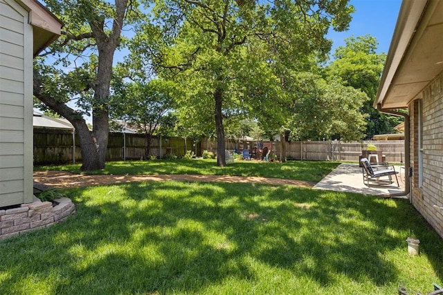 5 Larkens Pl, Shawnee, OK 74801 - fenced backyard with a patio