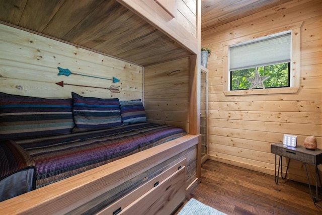 173 Guppy Ln, Hochatown, OK 74728 - bedroom featuring wood walls, dark wood-style floors, and wood ceiling