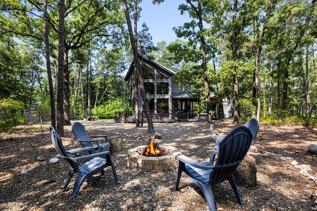 173 Guppy Ln, Hochatown, OK 74728 - view of yard featuring a fire pit