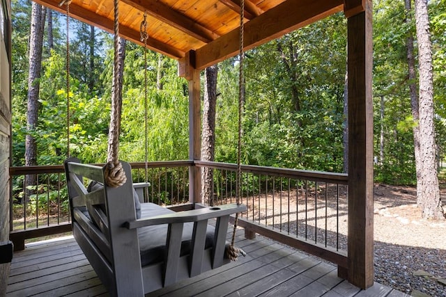 173 Guppy Ln, Hochatown, OK 74728 - wooden deck with a wooded view