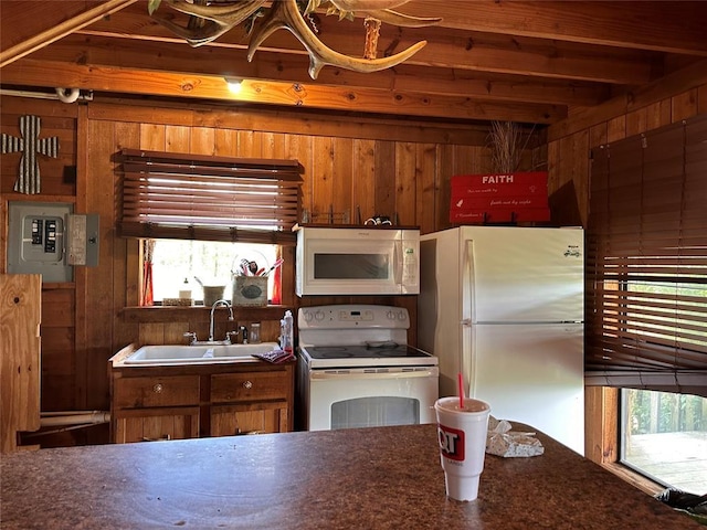 182424 N 4159th Rd, Moyers, OK 74557 - kitchen featuring white appliances, wooden walls, electric panel, beam ceiling, and dark countertops