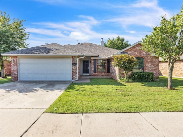 4001 Tori Pl, Yukon, OK 73099 - single story home with a garage, brick siding, and driveway