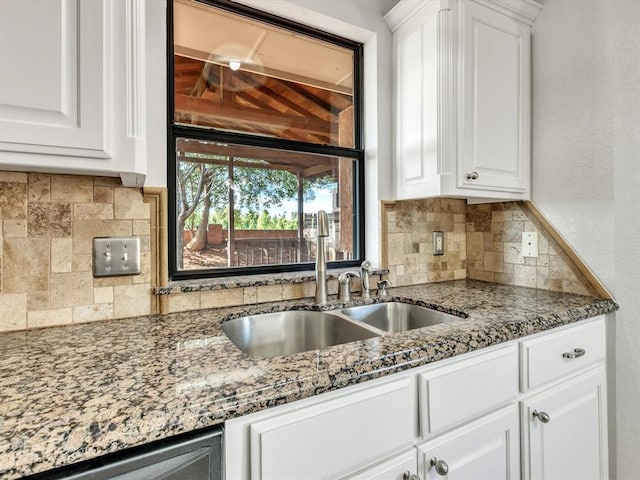 4001 Tori Pl, Yukon, OK 73099 - kitchen featuring tasteful backsplash, white cabinetry, dark stone countertops, dishwashing machine, and a textured wall