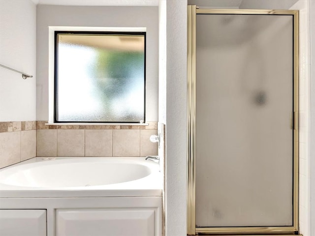 4001 Tori Pl, Yukon, OK 73099 - full bathroom featuring a shower stall and a bath