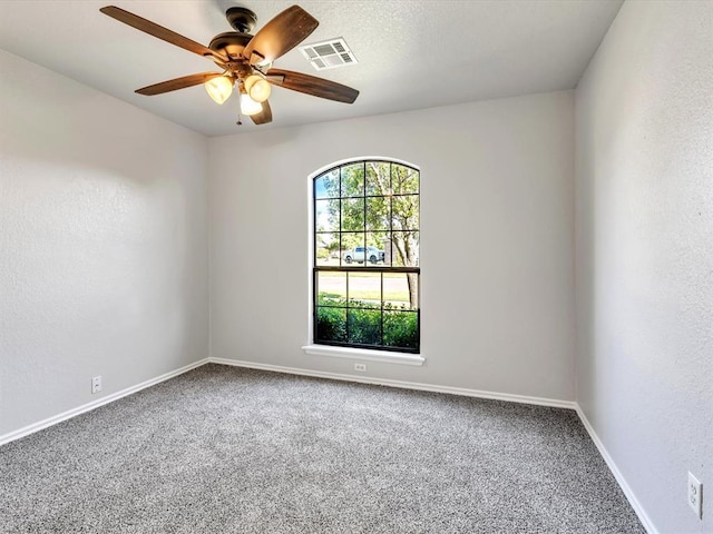 4001 Tori Pl, Yukon, OK 73099 - carpeted empty room featuring a ceiling fan and baseboards