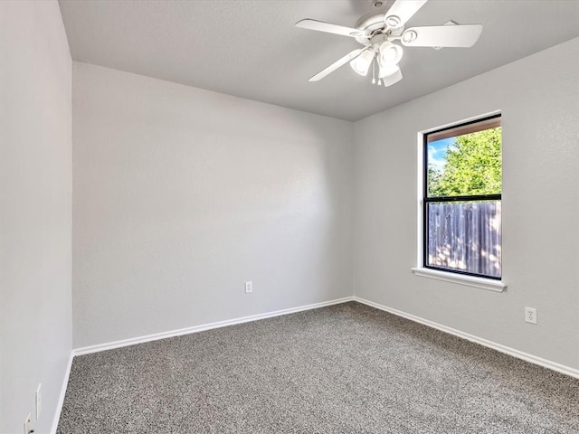 4001 Tori Pl, Yukon, OK 73099 - carpeted empty room with a ceiling fan and baseboards