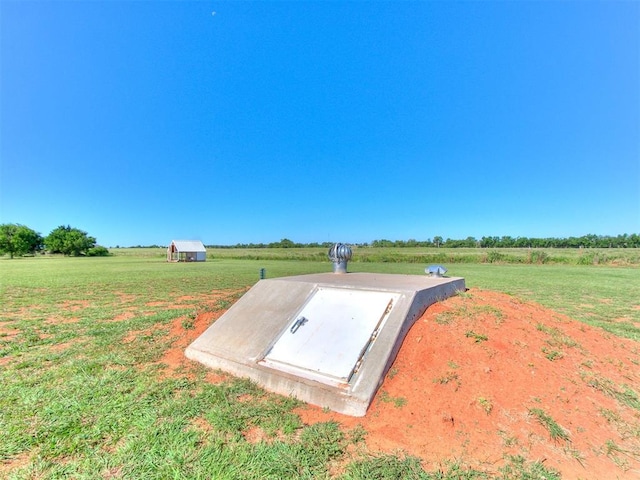 5053 Northridge Run, Cashion, OK 73016 - view of storm shelter featuring a rural view and a lawn