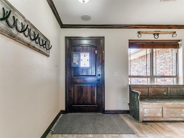 5053 Northridge Run, Cashion, OK 73016 - foyer featuring crown molding and light wood finished floors