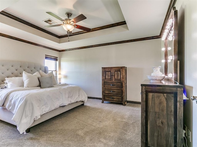 5053 Northridge Run, Cashion, OK 73016 - bedroom with carpet, a tray ceiling, ornamental molding, and ceiling fan