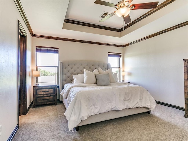 5053 Northridge Run, Cashion, OK 73016 - bedroom featuring carpet flooring, crown molding, a ceiling fan, and a tray ceiling