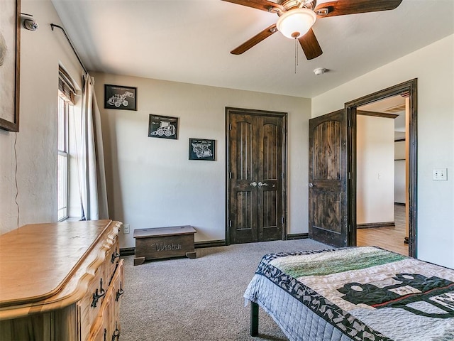 5053 Northridge Run, Cashion, OK 73016 - bedroom with carpet flooring, a closet, and a ceiling fan