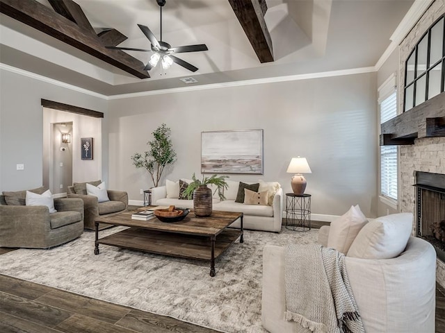 11716 SW 47th St, Mustang, OK 73064 - living room with wood finished floors, a ceiling fan, a fireplace, coffered ceiling, and beam ceiling