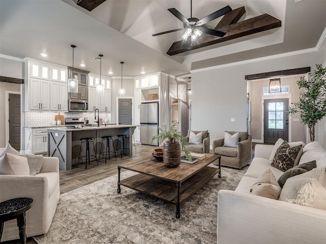11716 SW 47th St, Mustang, OK 73064 - living room with recessed lighting, a ceiling fan, ornamental molding, and light wood-type flooring