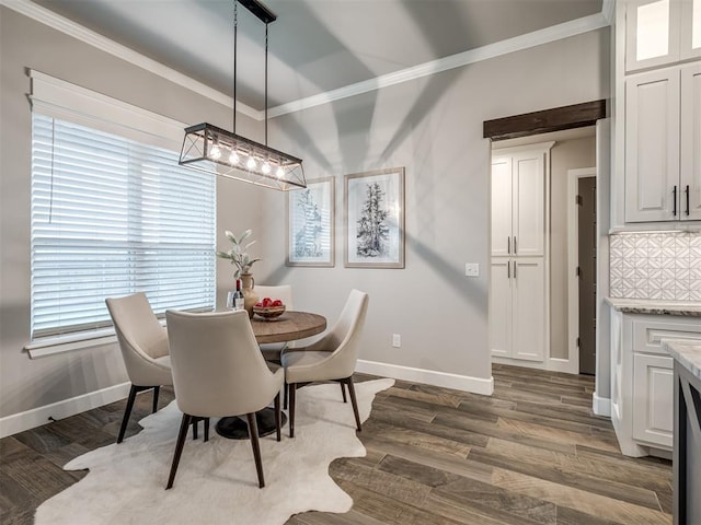 11716 SW 47th St, Mustang, OK 73064 - dining space with ornamental molding, dark wood finished floors, and a chandelier