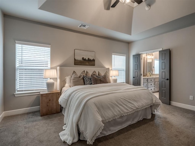 11716 SW 47th St, Mustang, OK 73064 - bedroom featuring light carpet, connected bathroom, a ceiling fan, and a towering ceiling