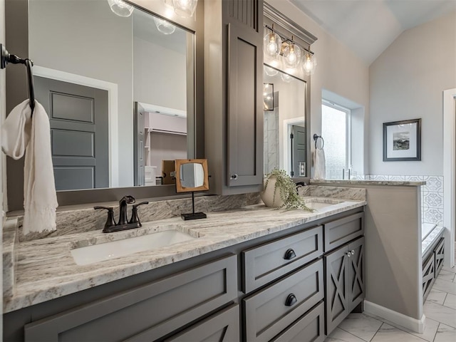 11716 SW 47th St, Mustang, OK 73064 - full bath featuring marble finish floors, double vanity, and vaulted ceiling