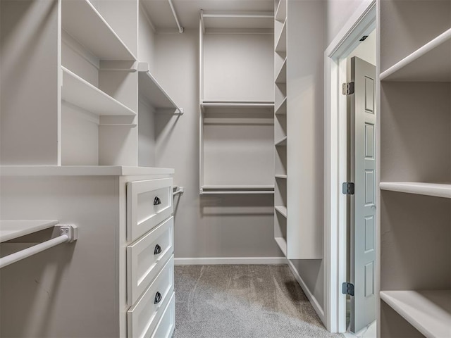 11716 SW 47th St, Mustang, OK 73064 - spacious closet featuring carpet flooring